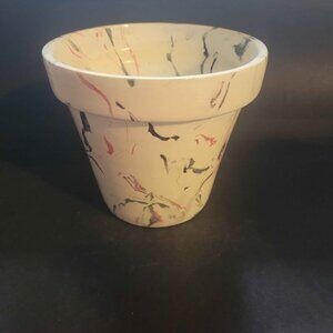 Hand-Painted Terracotta Plant Pot With a White Base And Black And Pink Accents